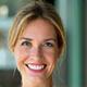 Sarah L., 48, from Austin, smiling confidently